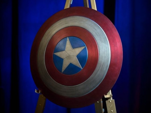 red white and blue shield with white star